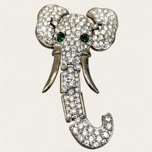 Vintage articulated rhinestone elephant brooch.